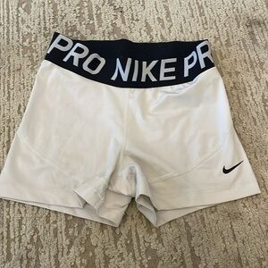 Women’s white nike pros